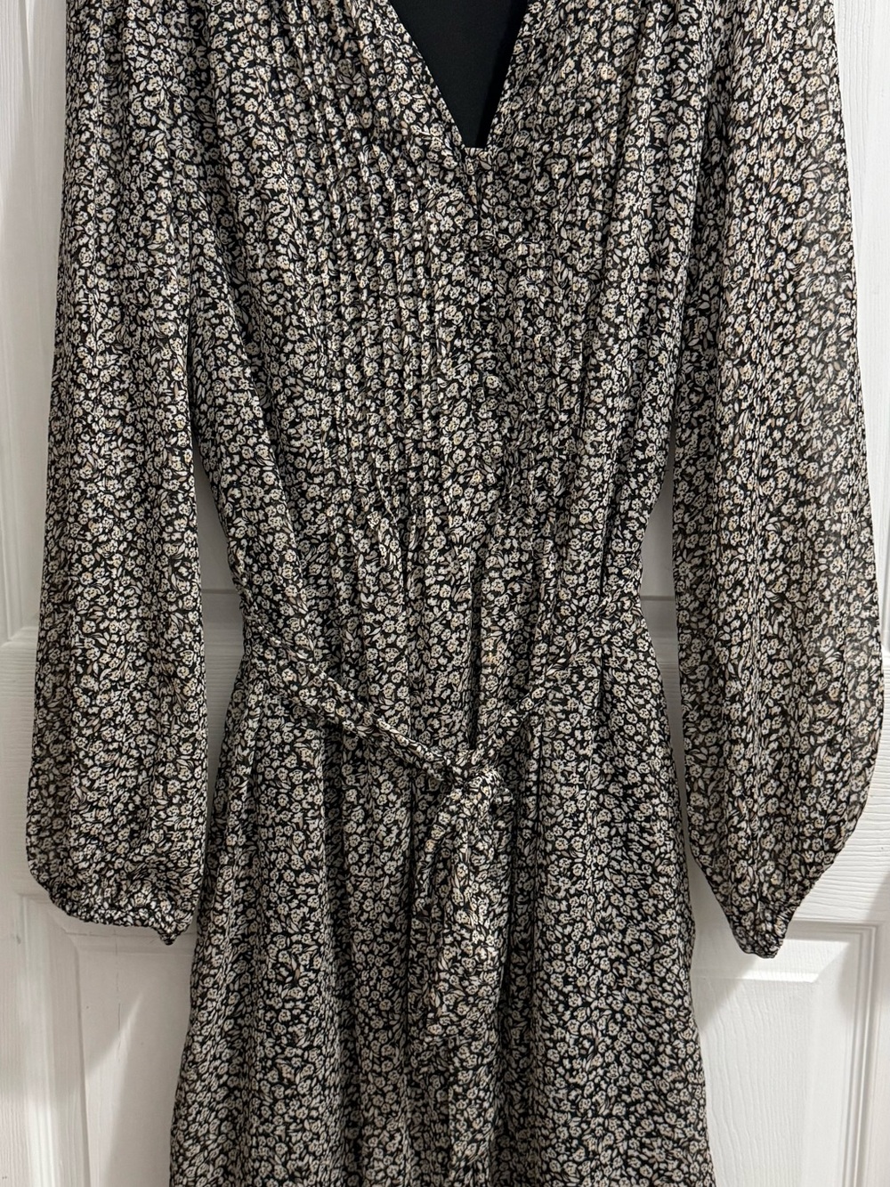 Women’s Black and Cream Floral Long Sleeve Dress with gold pin striping.
